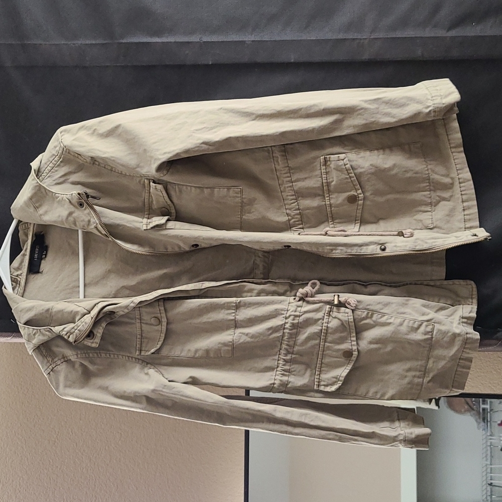 Utility jacket with a hood